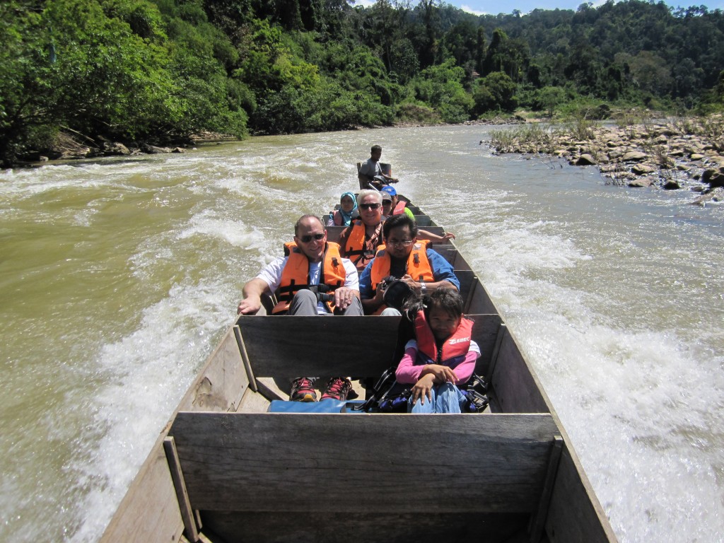 Running the river rapids on our way back to the pier at the Tman Negara Rainforest Entry.